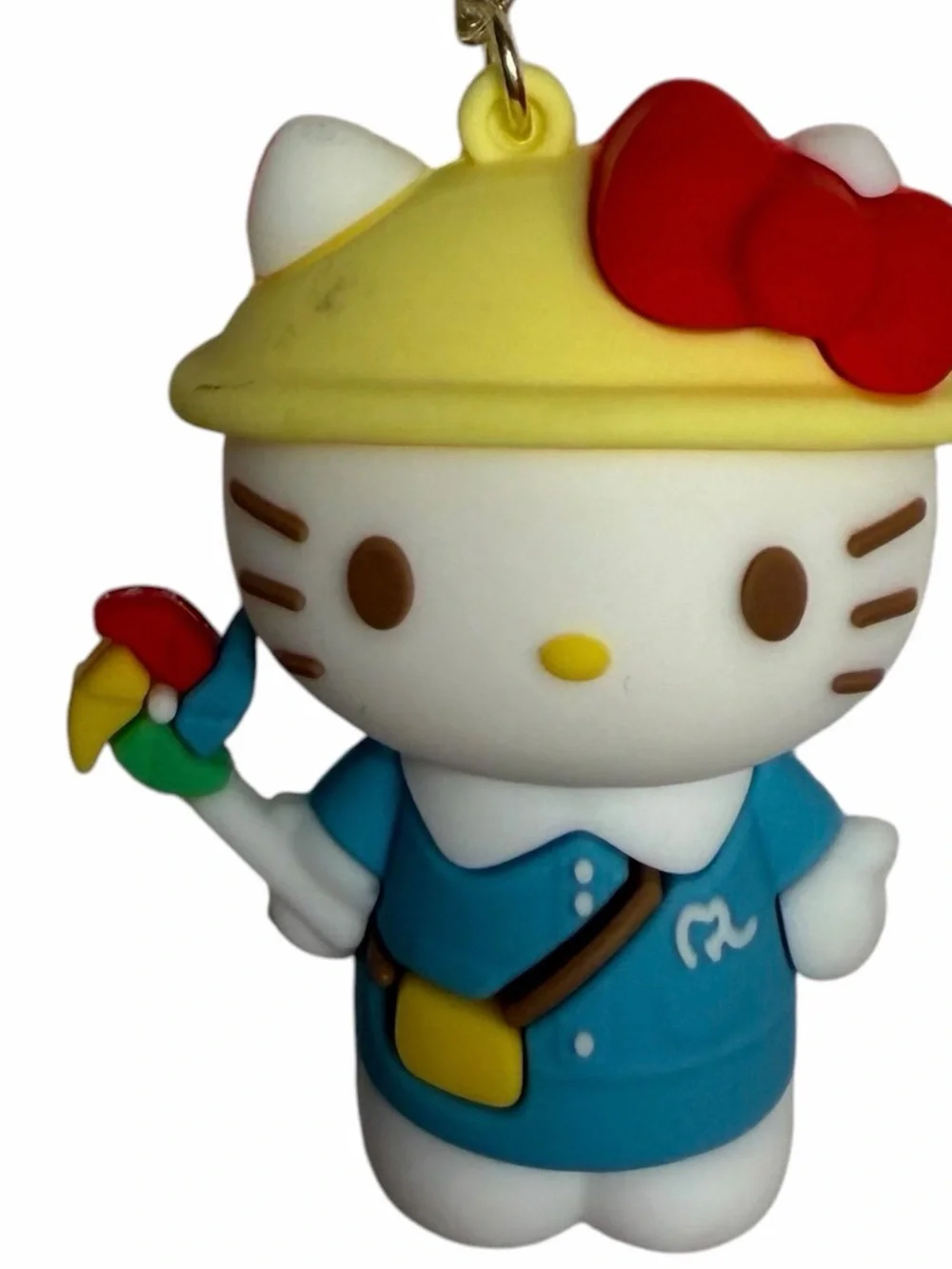 Hello Kitty Blue Outfit with pinwheel. Keychain/ wristlet.